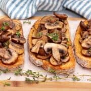 Mushroom bruschetta on a cutting board