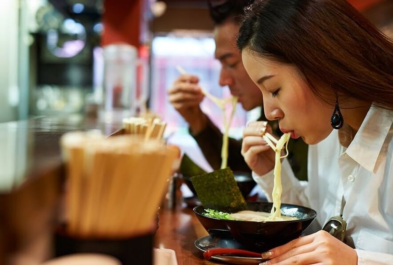 Slurping Noodles In Japan