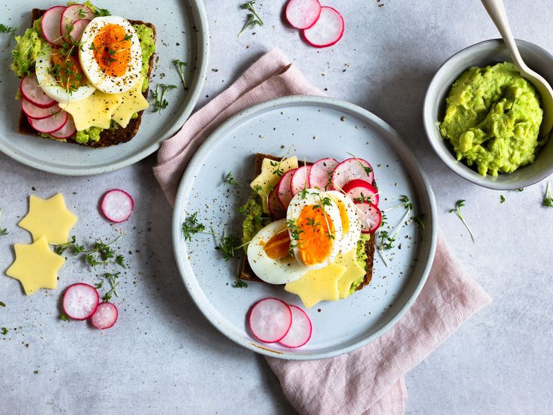 Avocado And Eggs On Wholegrain Rye Toast