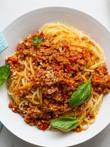 Top view spaghetti with meat sauce and cheese bolognese in bowl food