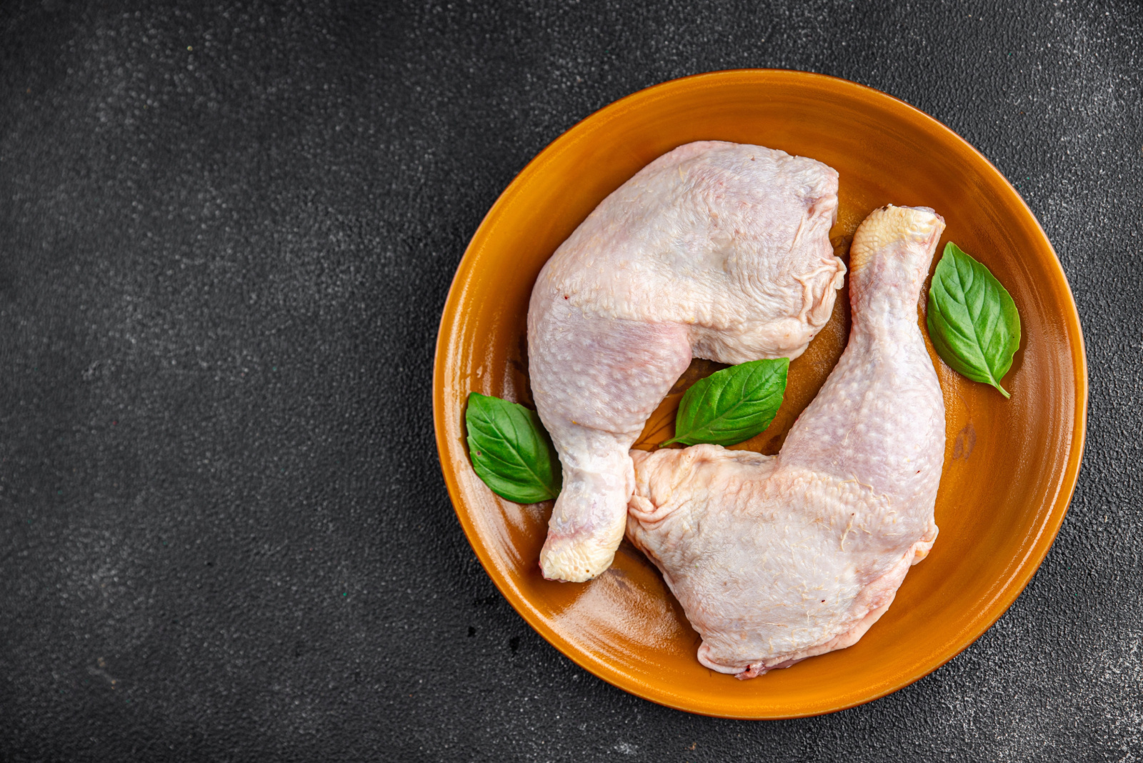 chicken legs raw meat chicken thighs poultry flesh on the bone gourmet fresh meal food snack on the table copy space food background rustic top view