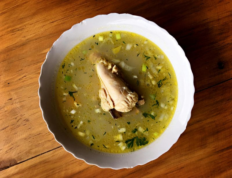 Hearty Ecuadorian Chicken Soup in White Bowl