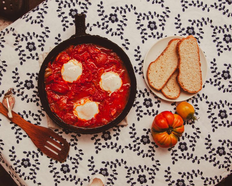 Delicious Shakshuka Dish with Bread Slices