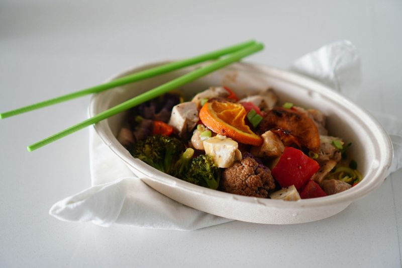 Tofu Stir Fry on White Bowl With Chopsticks