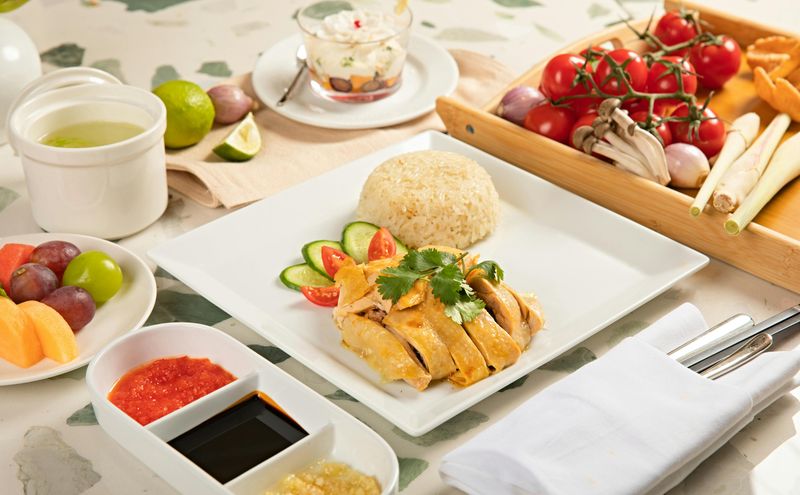 Delicious Hainanese Chicken Rice and Fresh Fruits