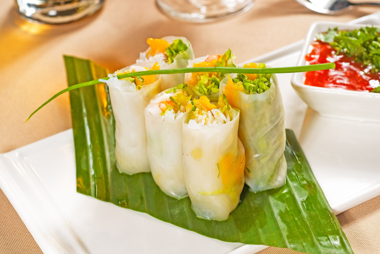fresh tipycal vietnamese style summer rolls,on a palm leaf