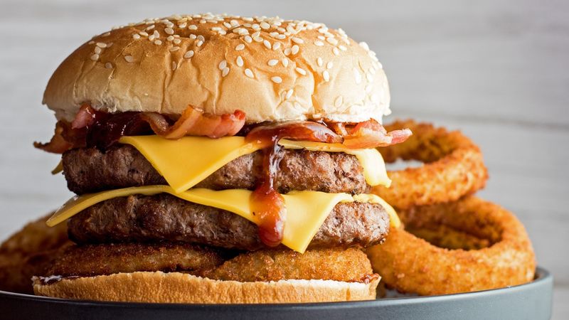 Penny - Classic Cheeseburger With A Side Of Onion Rings