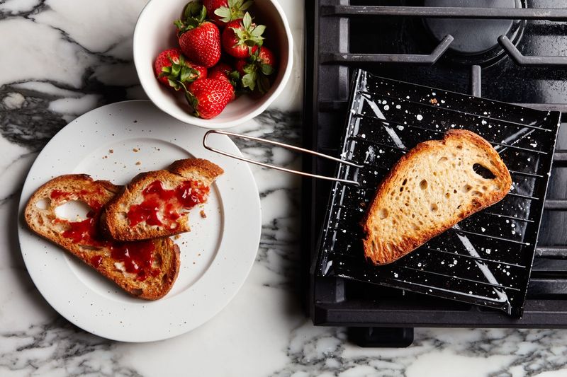 Toasting Bread On The Stove Or Fire