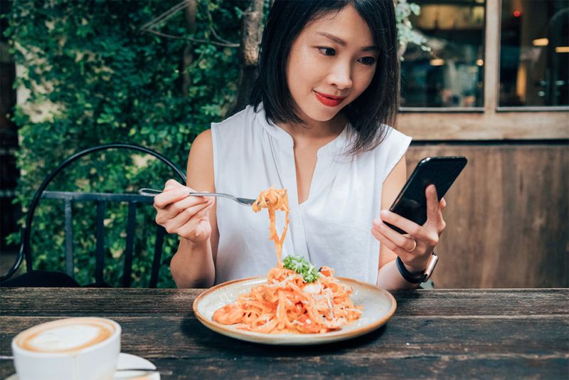 Eating While Distracted Or Scrolling On Your Phone