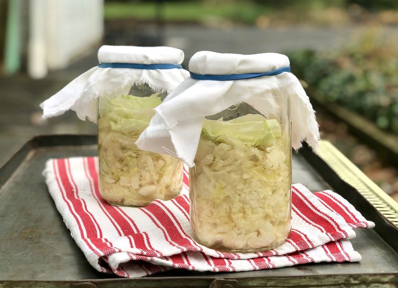Spoon Sauerkraut Onto Sandwiches Or Salads