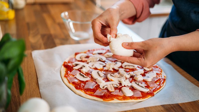 Simple Add-Ons That Take Frozen Pizza Up A Notch