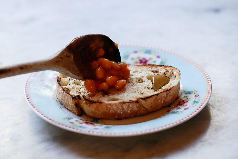 Beans On Toast Made Over A Gas Hob Or Open Flame