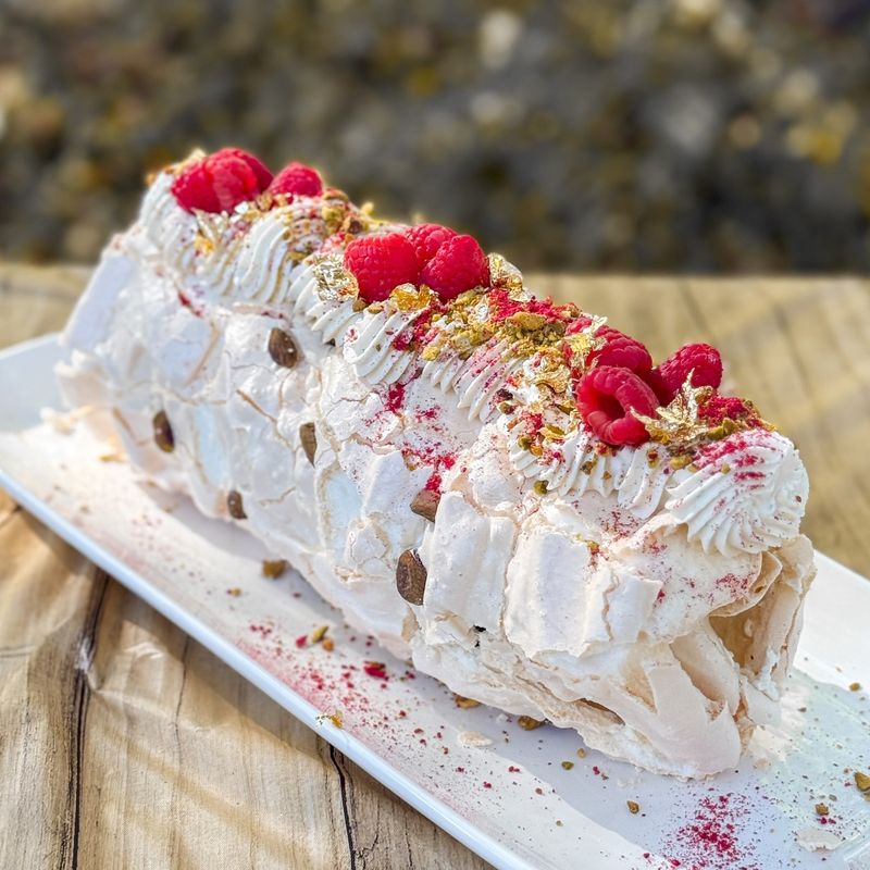 Raspberry And Pistachio Meringue Roulade