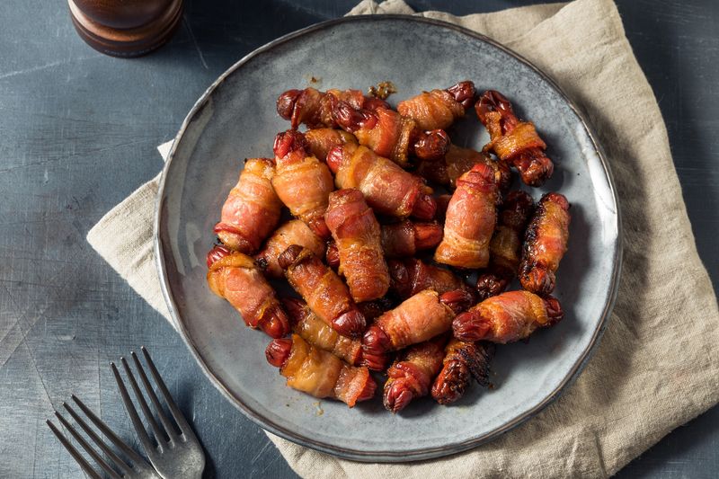 Why Pigs In Blankets Work Surprisingly Well As A Topping