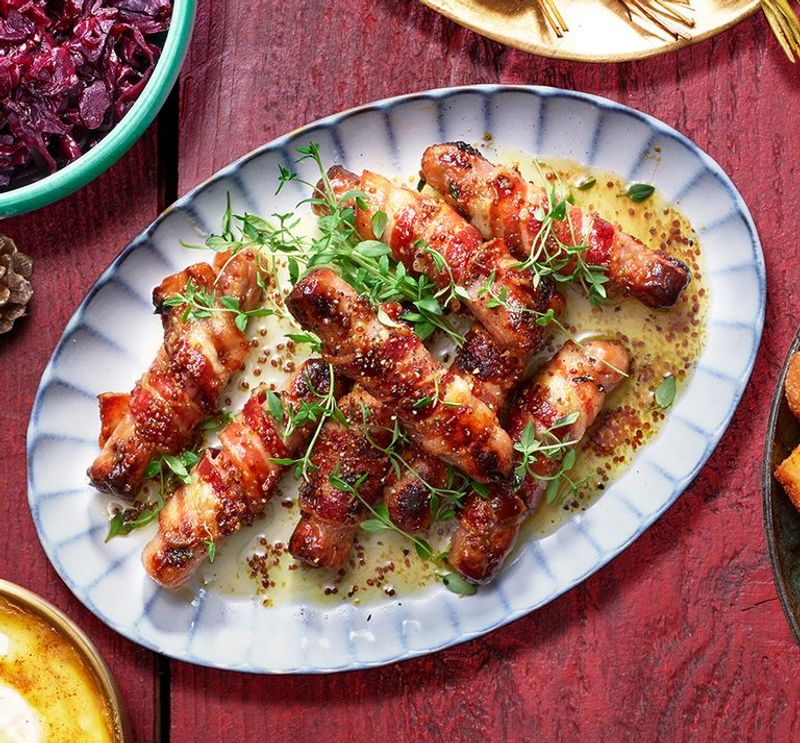 Pigs In Blankets Dipped In Gravy And Cranberry Sauce