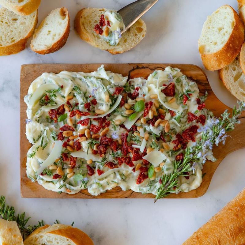 Roasted Garlic And Sun-Dried Tomato Butter Board