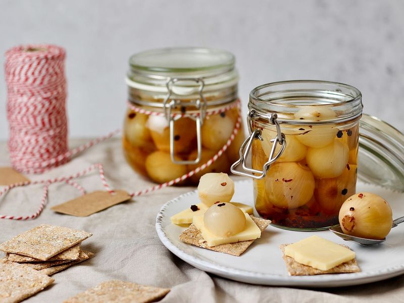 Pickled Onions And Cheddar On A Side Plate
