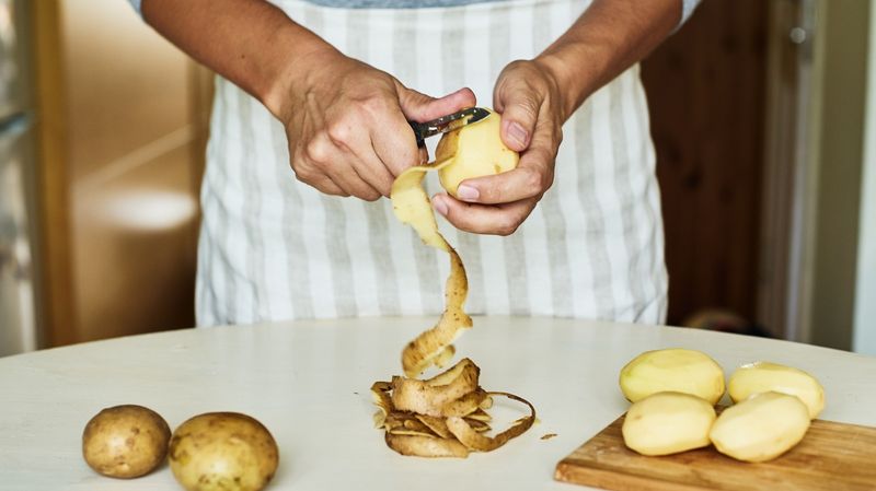 Peeling Mountains Of Potatoes