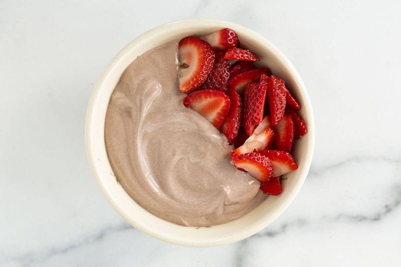 Greek Yoghurt With Cocoa Powder And Berries