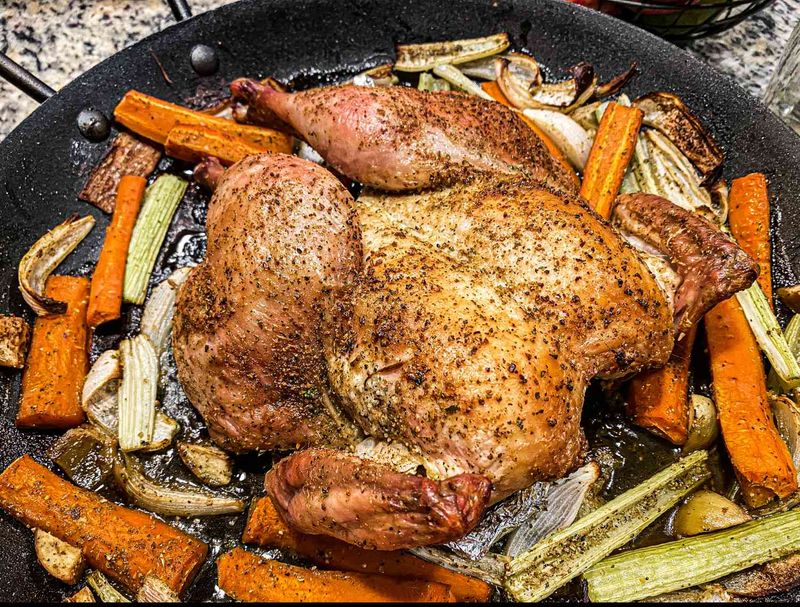 Roast Chicken With Roast Potatoes And Vegetables