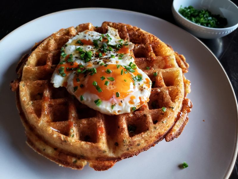 Savoury Cheddar And Chive Waffles With Fried Eggs