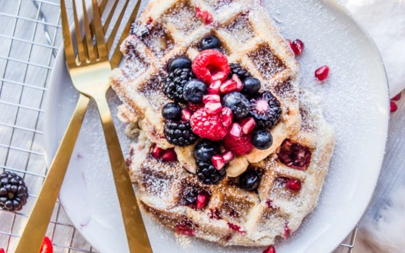 Raspberry And Almond Waffles With Icing Sugar