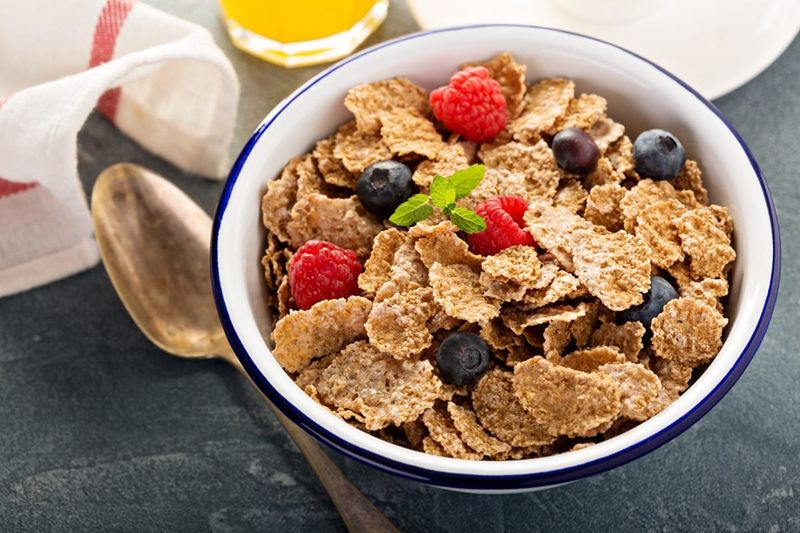 Wholegrain Cereal With Milk And Sliced Fruit