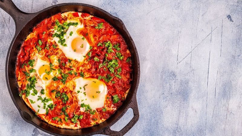 Baked Eggs With Tomatoes And Herbs
