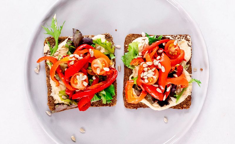 Hummus And Roasted Vegetables On Wholegrain Toast