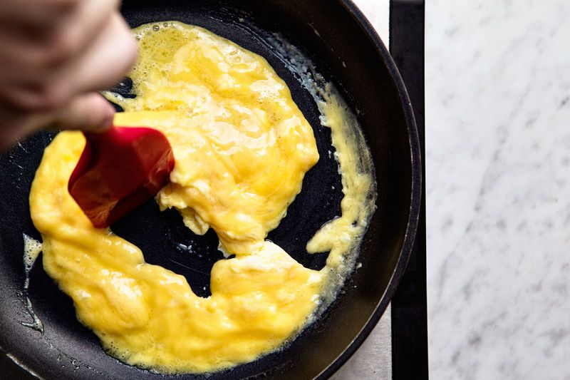 Adding Milk Makes Scrambled Eggs Creamier