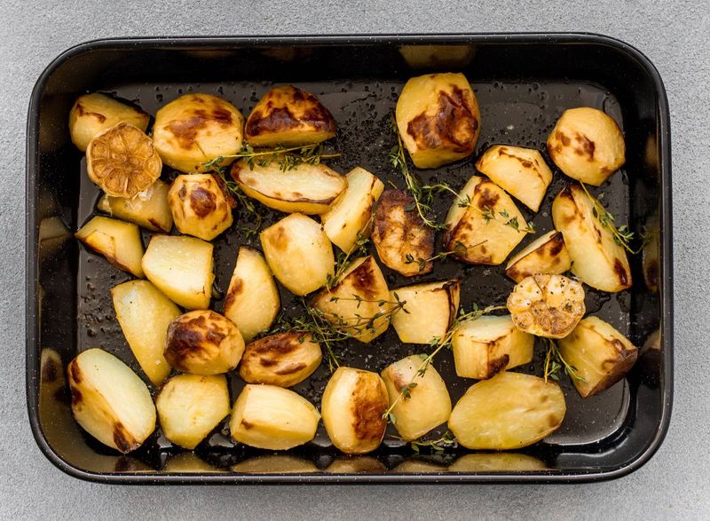 Leftover Roast Potatoes Standing By The Oven