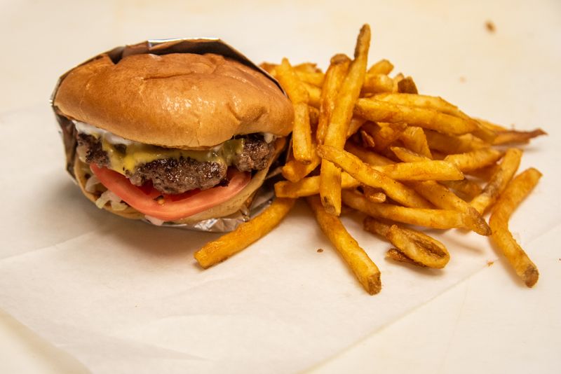 Cheeseburgers And Fries At Diners