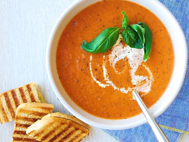 Creamy Tomato And Basil Soup With Toasted Cheese