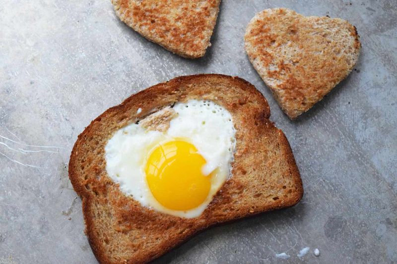 Heart-Shaped Fried Eggs In Toast