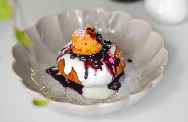 Papanași (Fried Doughnuts With Sour Cream And Jam)