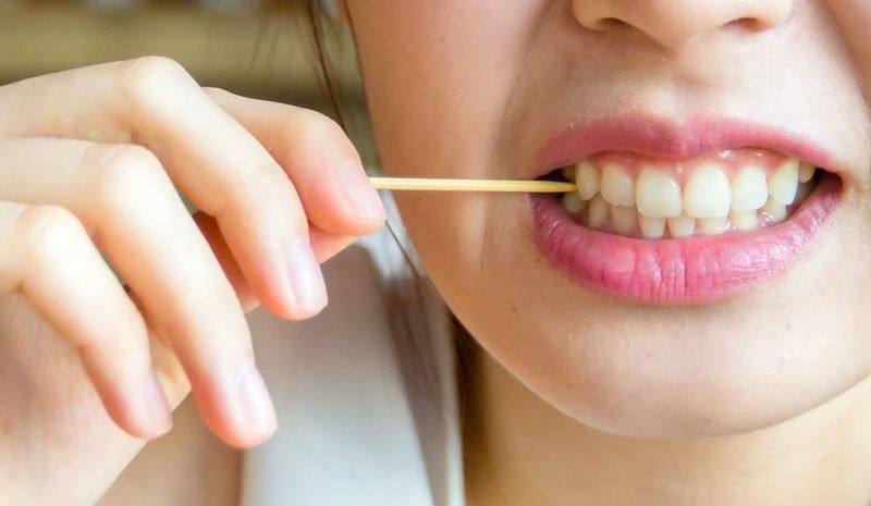 Picking Food Out Of Your Teeth At The Table