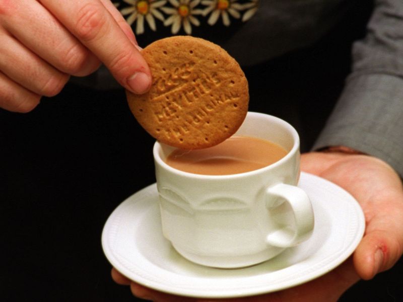 A Couple Of Biscuits With Tea That Magically Multiply