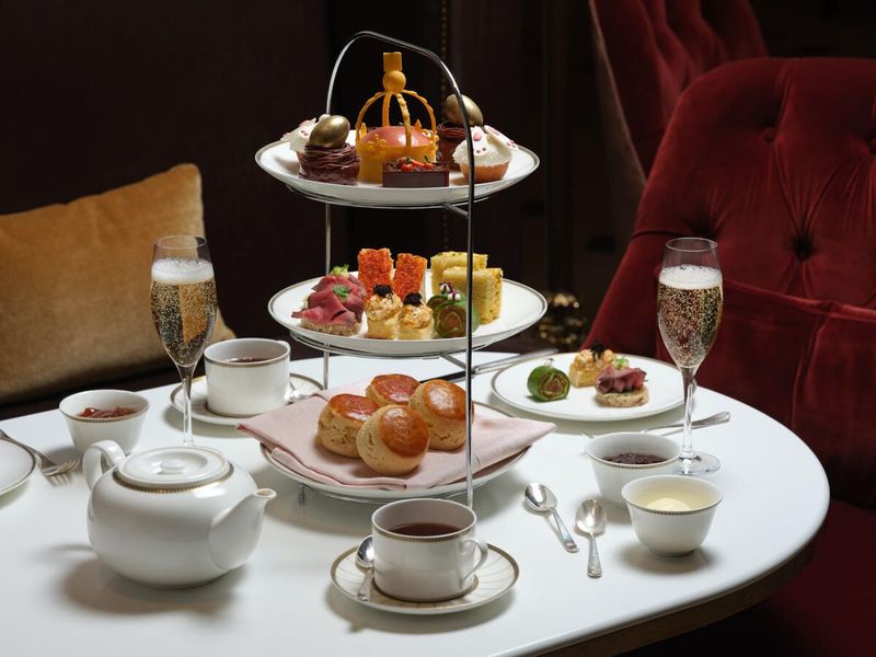 Following Afternoon Tea Serving Order (Savoury, Then Scones, Then Sweets)