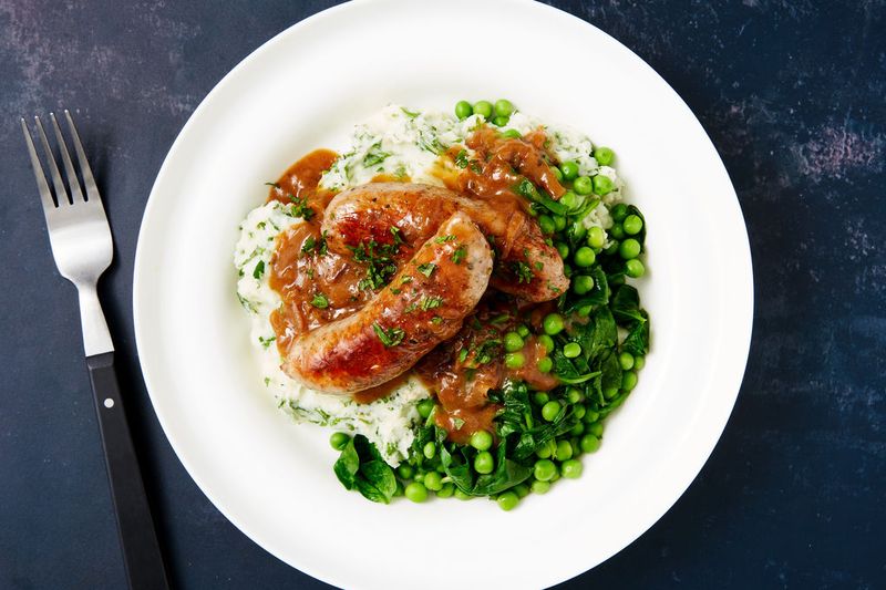 Sausage And Mash With Onion Gravy And Savoy Cabbage