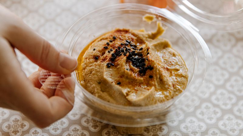 Hummus With A Spoon Or Random Crackers