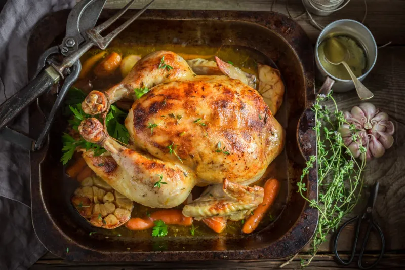 Chicken Roasting With Thyme And Garlic