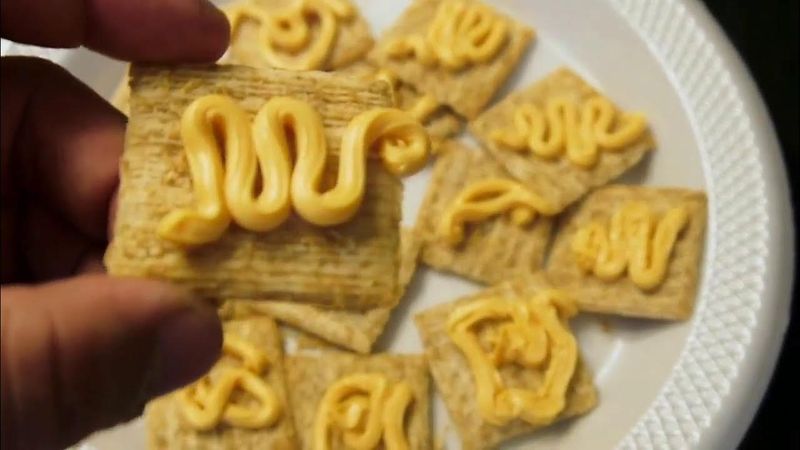 Spraying Cheese From A Can
