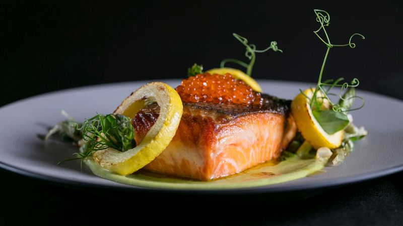 Seafood Dishes Such As Salmon Or Lobster