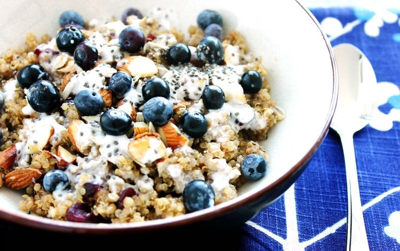 Quinoa Breakfast Bowl With Almond Milk And Berries