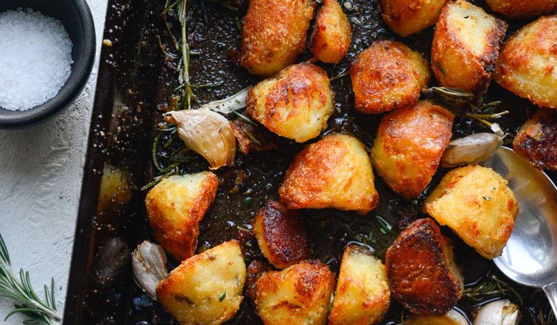 Tossing Roast Potatoes In Semolina For Extra Crispness