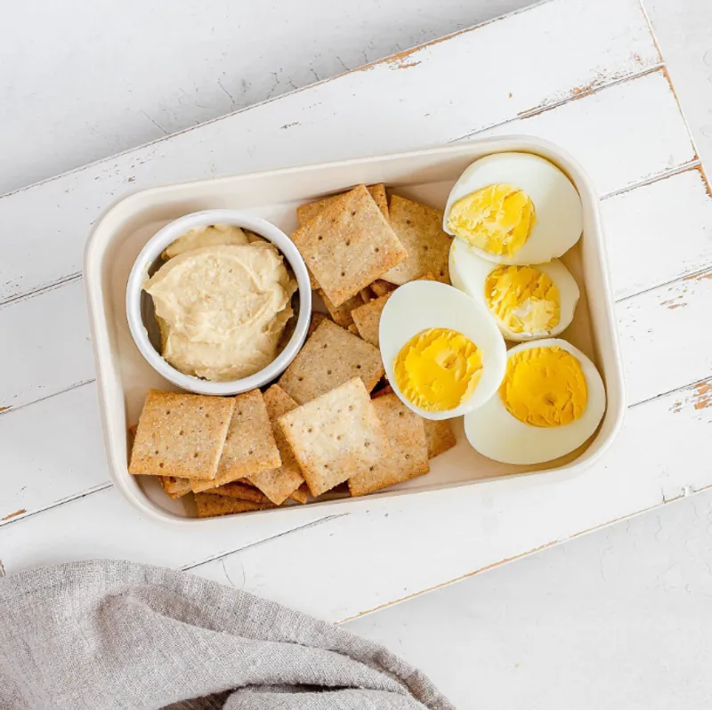 Hard-Boiled Eggs with Whole Grain Crackers and Hummus