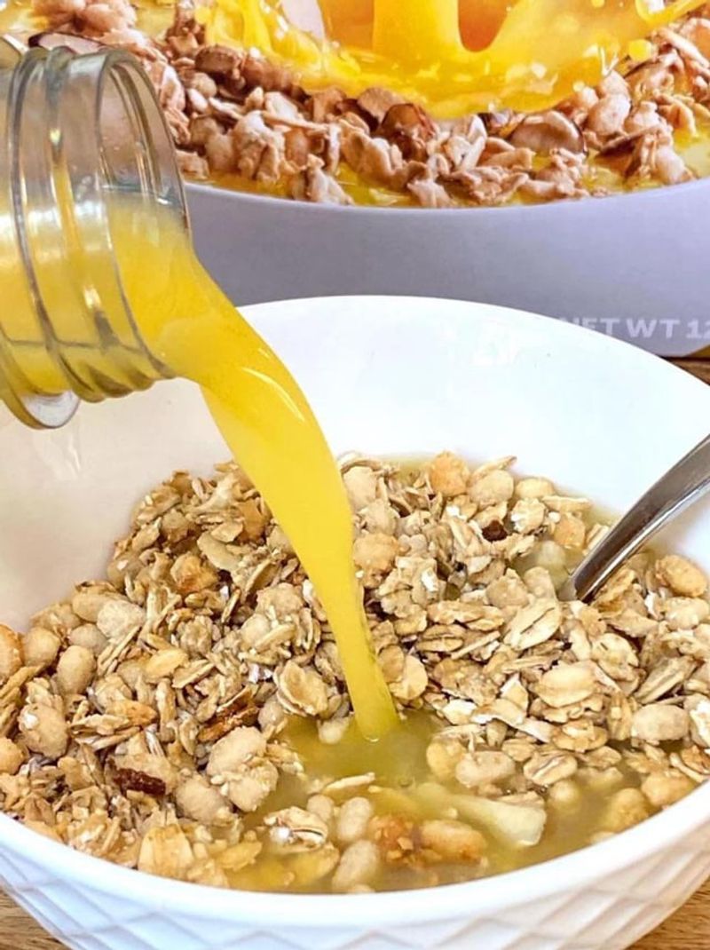 Cereal Dunked in Orange Juice