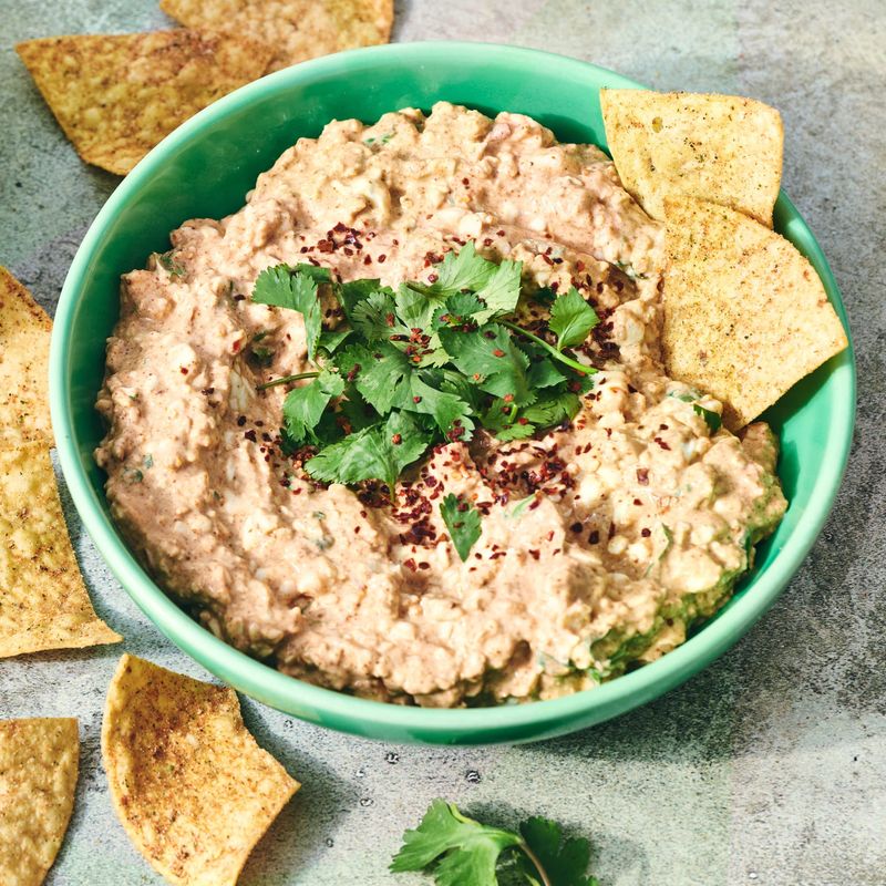 Chips Crumbled Into a Bowl of Cottage Cheese