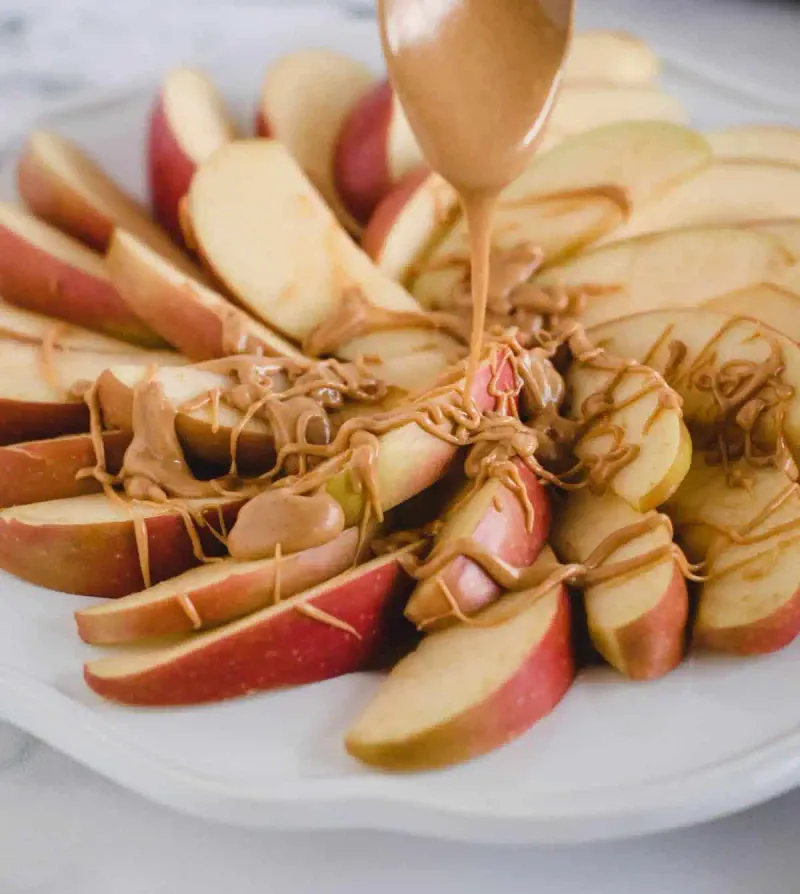 Spread Peanut Butter on Apple Slices