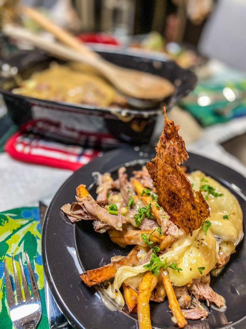 Duck Confit Poutine with Crispy Skin Crumbles